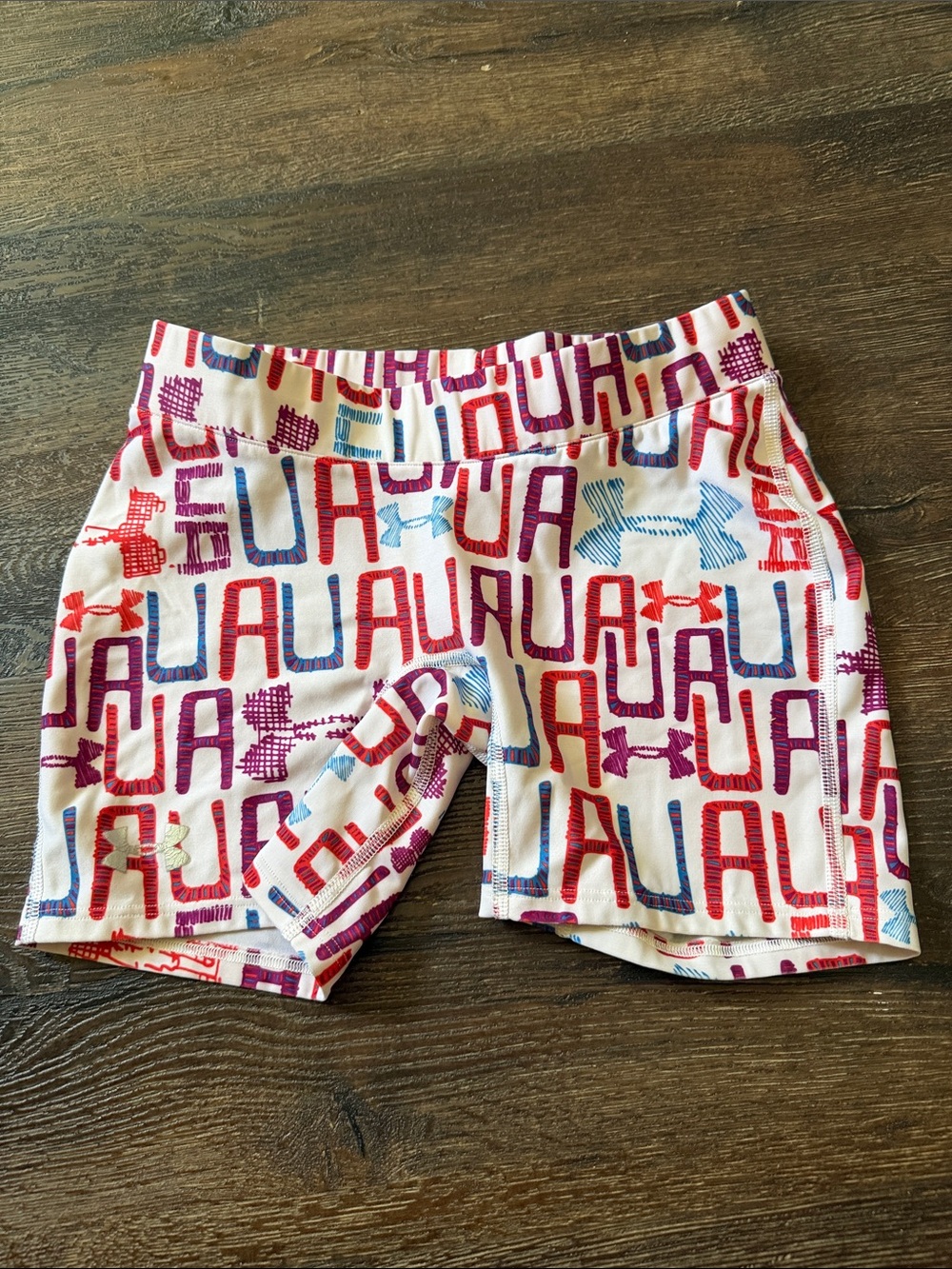 Under Armour White Athletic Shorts with Red, Purple & Blue UA Print